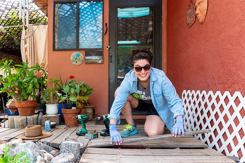 Woman working on porch